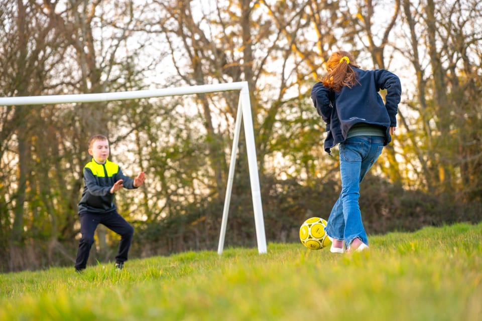 There is a football goal to enjoy or get creative and make your own entertainment