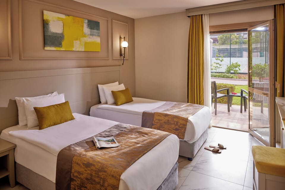 Classic Double Room | Minibar (some free items), in-room safe, desk, laptop workspace