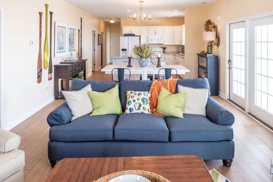 Bright open living space with comfortable sofa and dining area