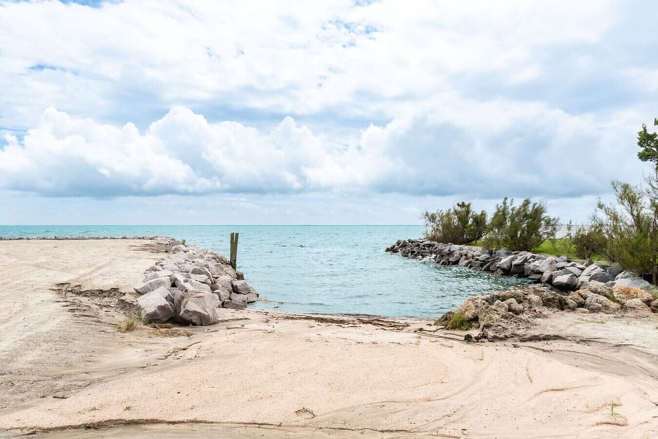 Perfect place to launch kayaks or pop in for a dip! We recommend water shoes to avoid any sharp shells!