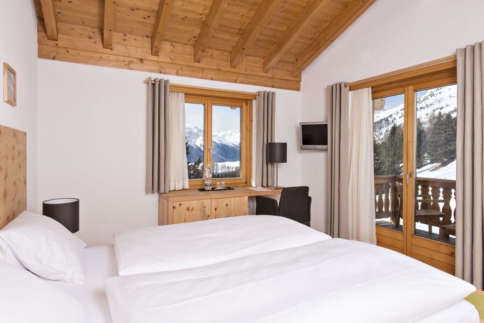 Double Room with Balcony | 1 bedroom, hypo-allergenic bedding, down comforters, in-room safe