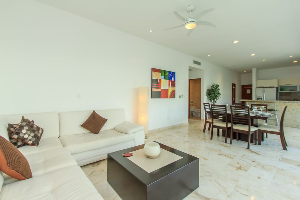 Deluxe Condo, 2 Bedrooms, Balcony (Condo Coral) | Living area | Flat-screen TV