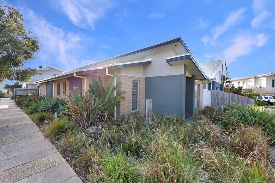Street view with landscaped gardens