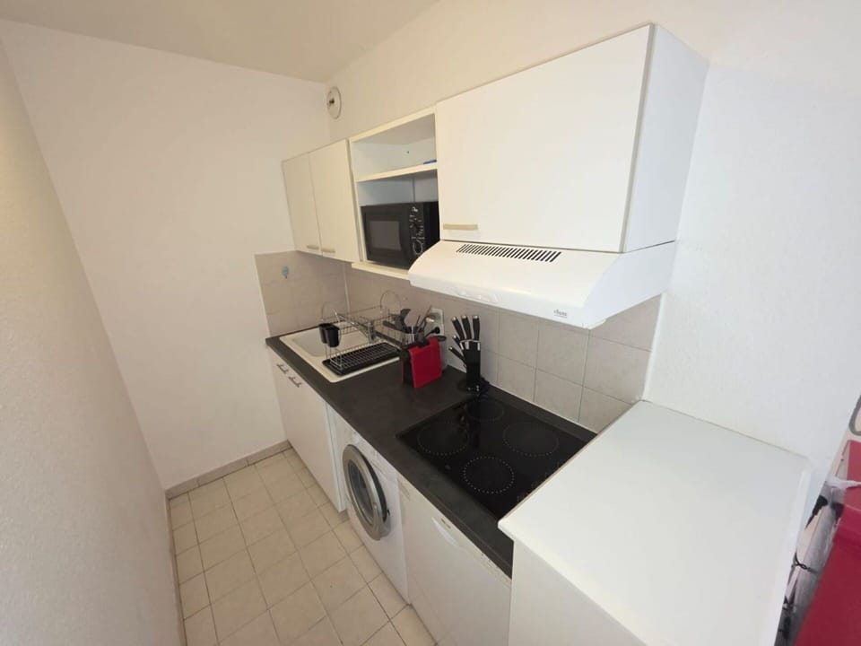 Kitchen, Flooring, Countertop, Interior Design, Floor, Kitchen Appliance, Major Appliance, Room, Sink, Kitchen Stove