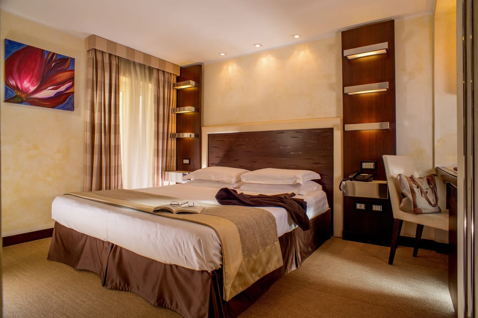 Standard Double Room, 1 Double Bed | Minibar, in-room safe, soundproofing, iron/ironing board