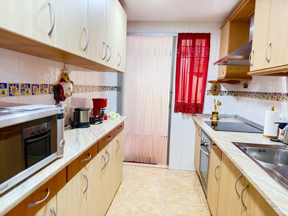 Whip up your favorite dishes in our fully equipped kitchen. Here you'll find everything you need to feel at home, from a coffee maker to a microwave and washing machine.