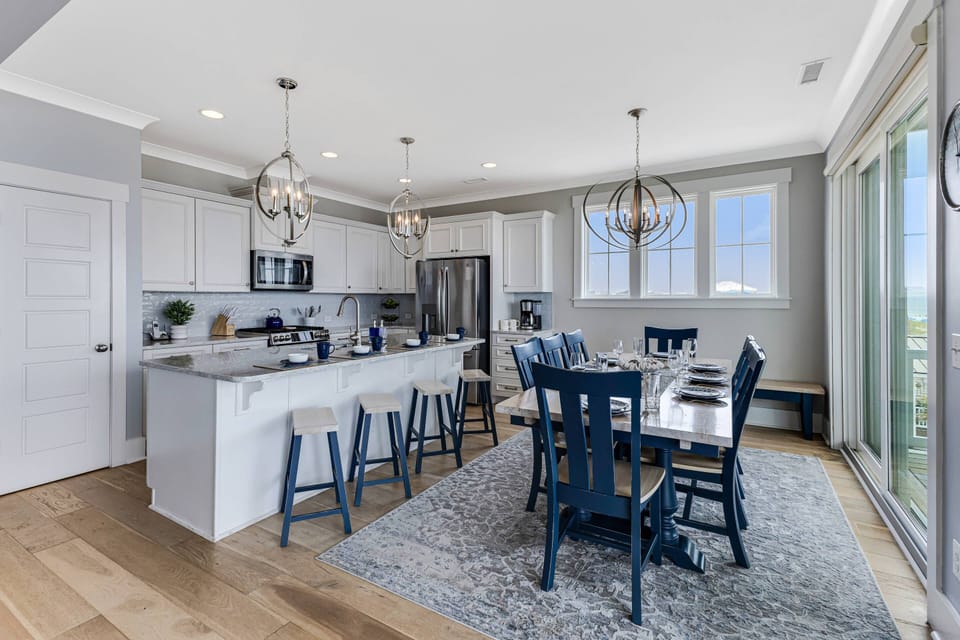 Seating for 4 at the large kitchen island & seating for 8 at the dining table.