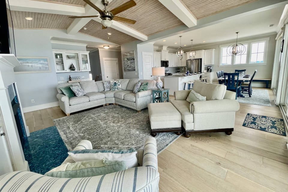 The open concept plan allows everyone to be together while engaged in their own activities.