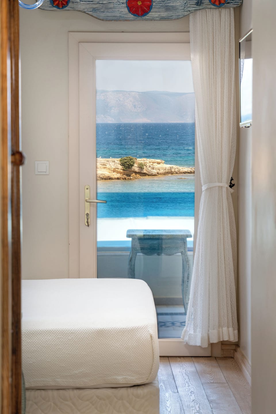 Family Room, Balcony, Sea View | Minibar, free WiFi, bed sheets