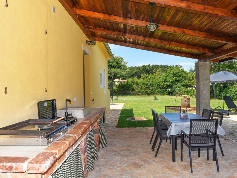 Furniture, Outdoor Furniture, Backyard, Shade, Chair, Outdoor Table, Kitchen & Dining Room Table, Garden, Outdoor Structure, Patio