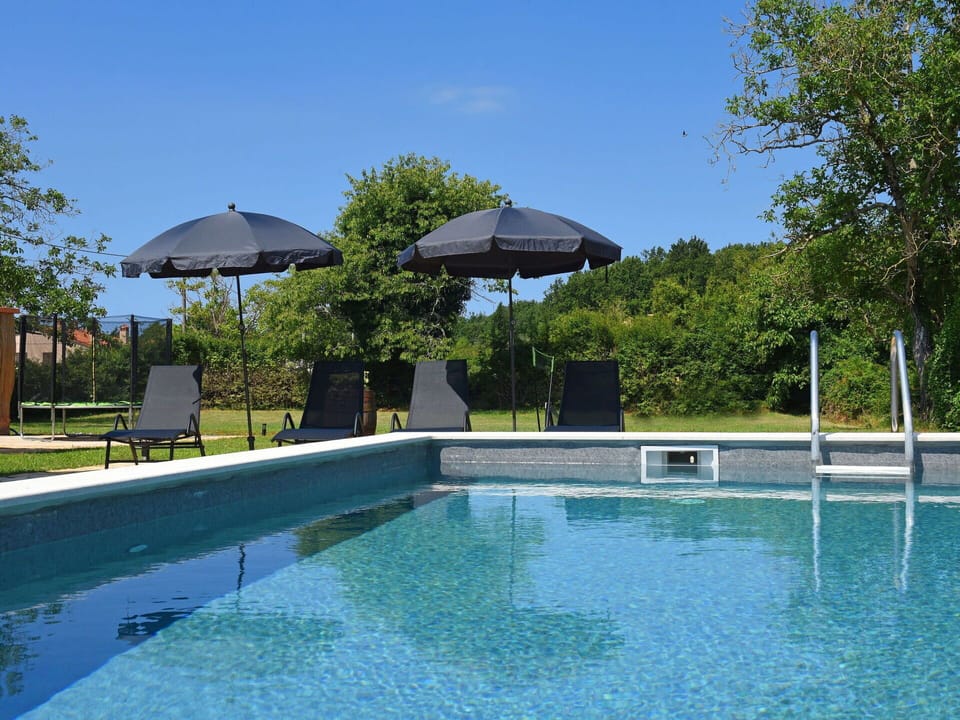 Swimming Pool, Water, Umbrella, Outdoor Furniture, Resort, Composite Material, Shade, Leisure, Sunlounger, Water Feature