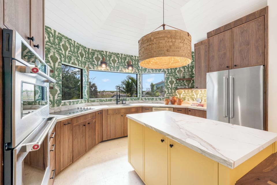 Full kitchen with modern appliances. 