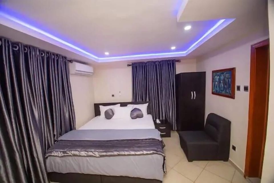 Deluxe Room, Balcony, City View | Desk, laptop workspace, blackout drapes, soundproofing