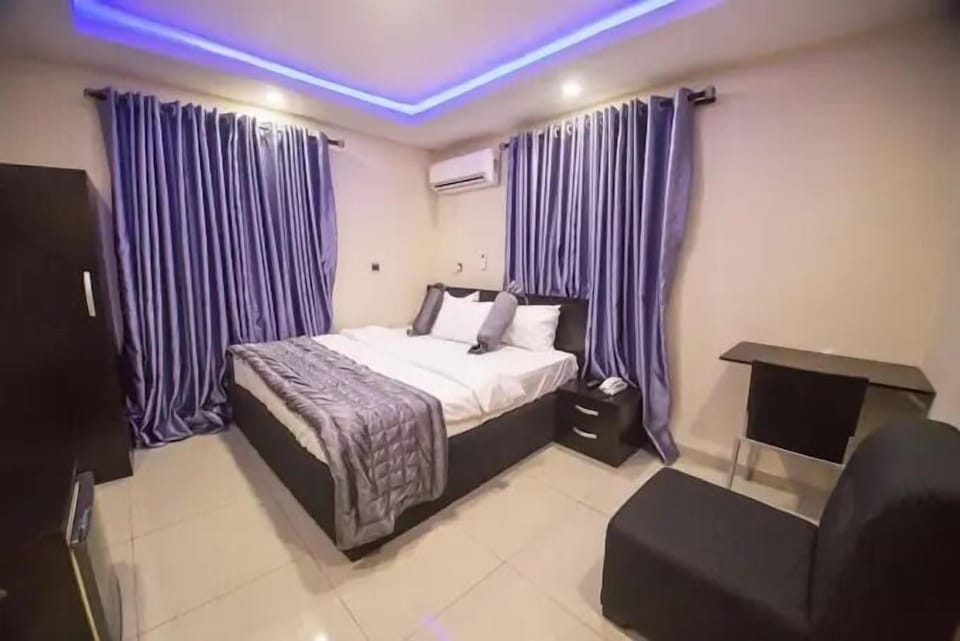 Deluxe Room, Balcony, City View | Desk, laptop workspace, blackout drapes, soundproofing