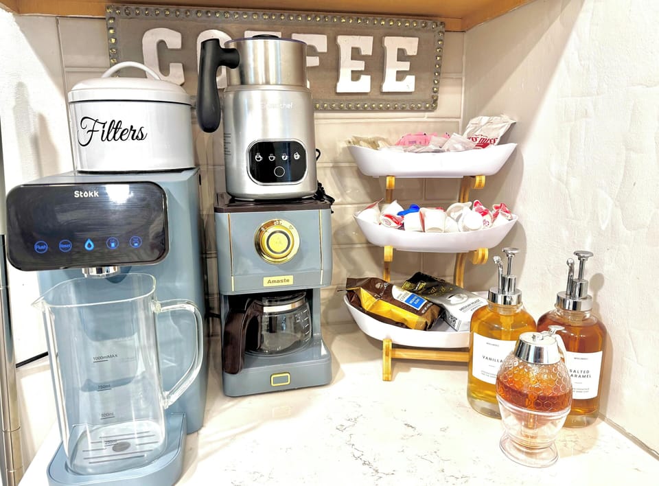 Full Coffee Bar. Includes a coffee maker, large frother machine that can heat milk for a delicious latte or just to have a hot cup of hot chocolate. 
Reverse osmosis machine, for clean crisp water.