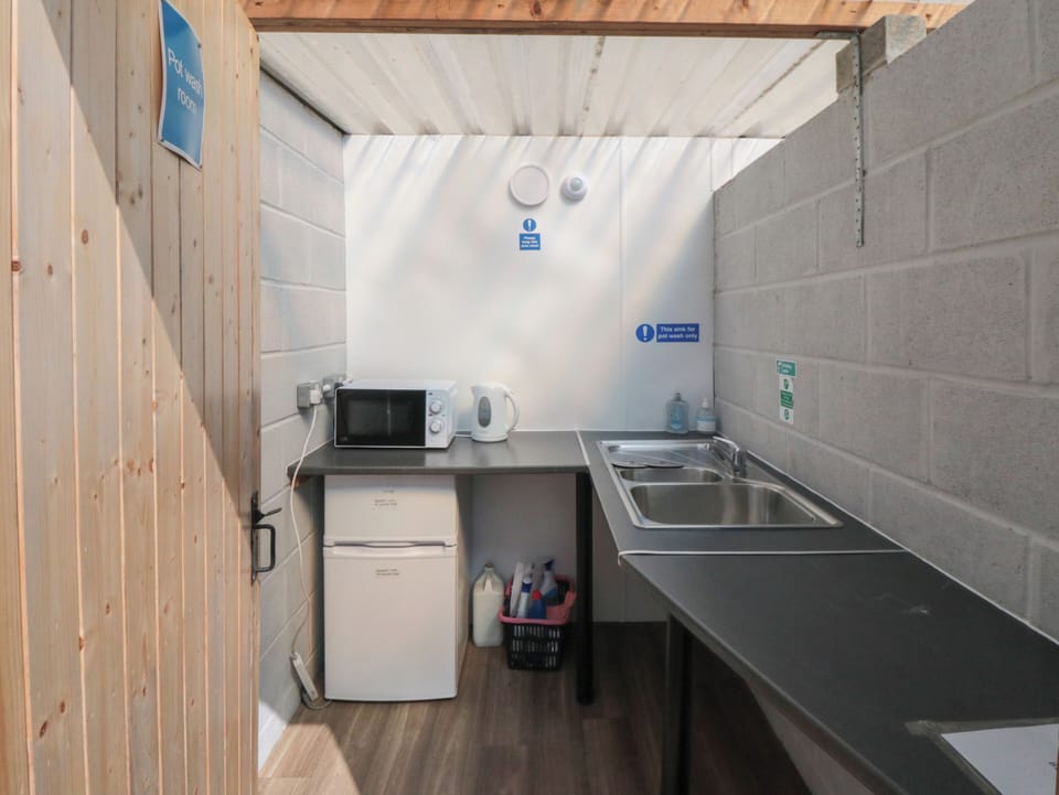 Fridge, microwave, cookware/dishes/utensils