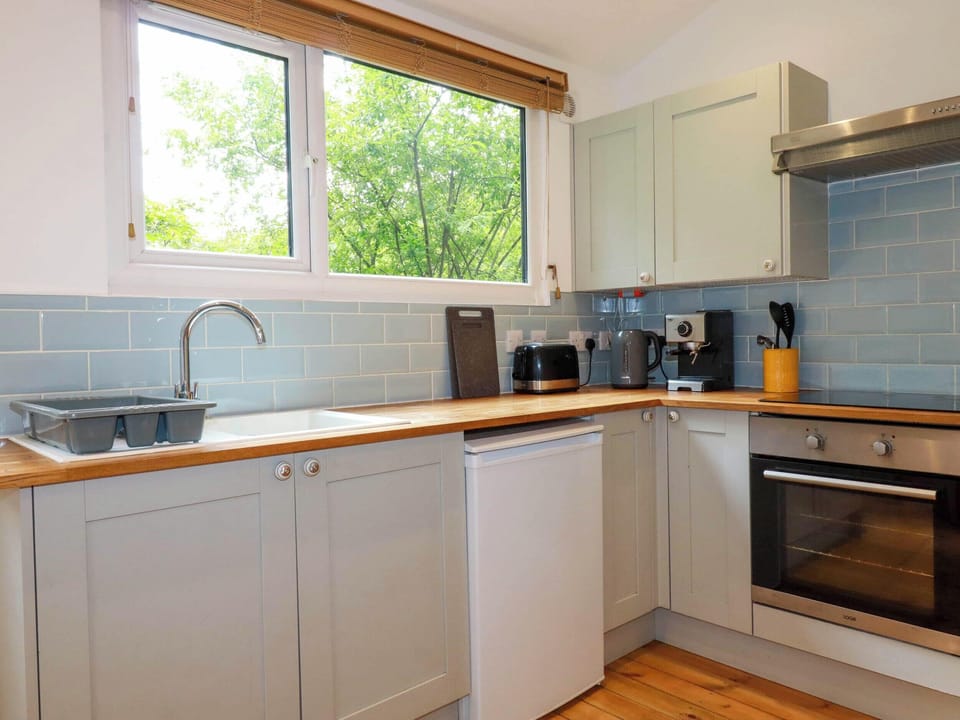 Fridge, microwave, toaster, cookware/dishes/utensils