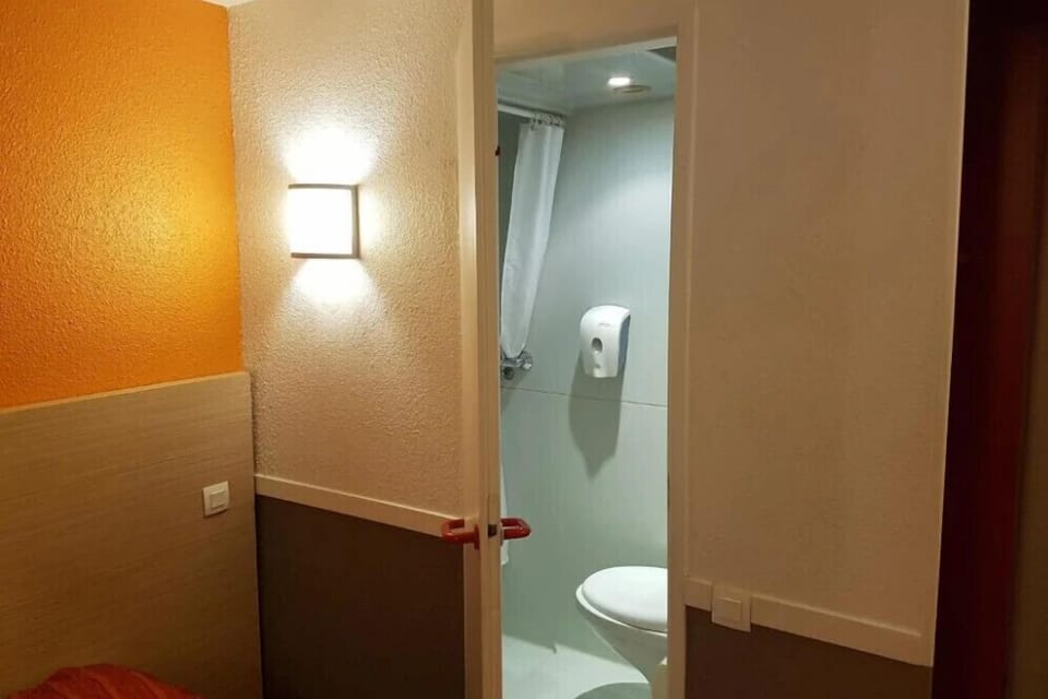 Desk, laptop workspace, blackout drapes, free WiFi