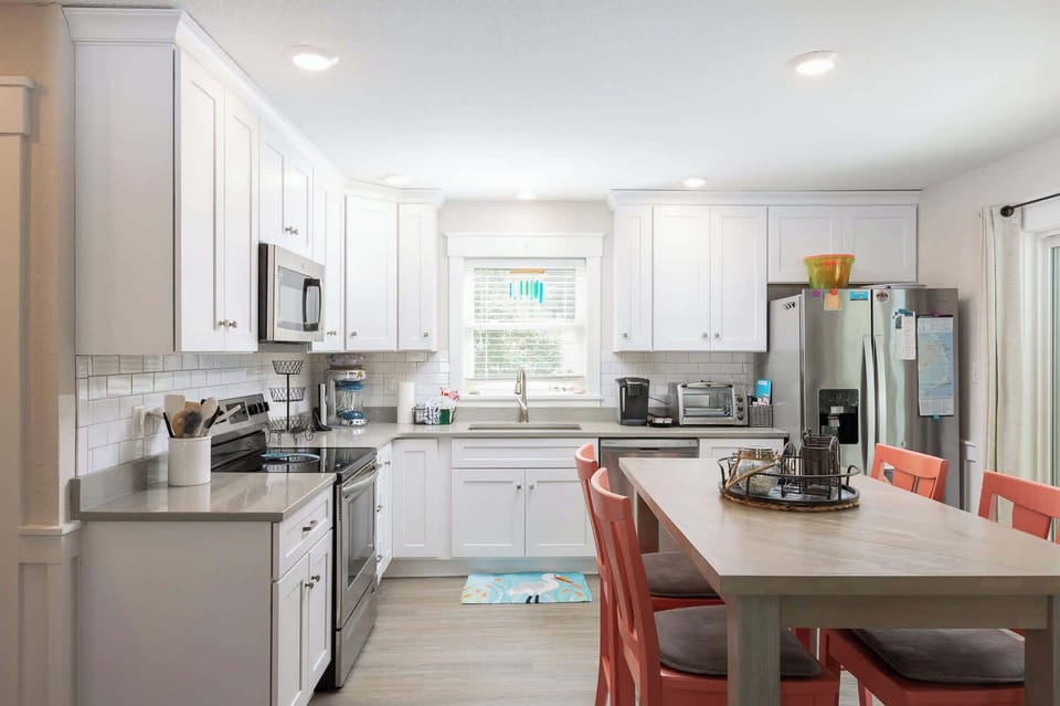 Top Floor Fully Equipped Kitchen and Dining Area