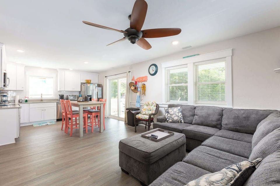 Top Floor Cozy Living Room with Smart TV and Dining Area
