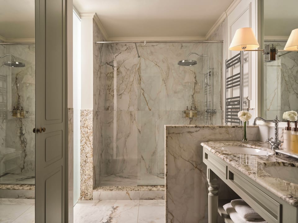 Shower, rainfall showerhead, designer toiletries, hair dryer