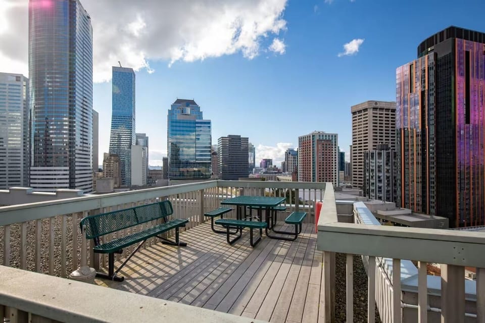 Unwind with sunset views and fresh air on the rooftop deck—perfect for photos!