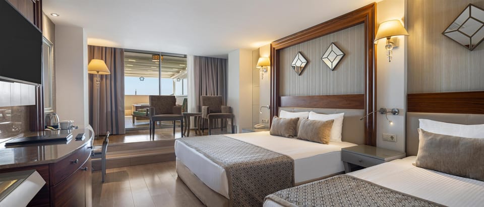 Family Room, 1 Bedroom, Jetted Tub | Minibar (free items), in-room safe, desk, WiFi (free)