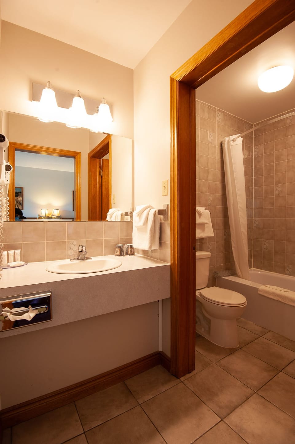 Classic Room, 2 Queen Beds | Bathroom | Combined shower/tub, free toiletries, hair dryer, towels