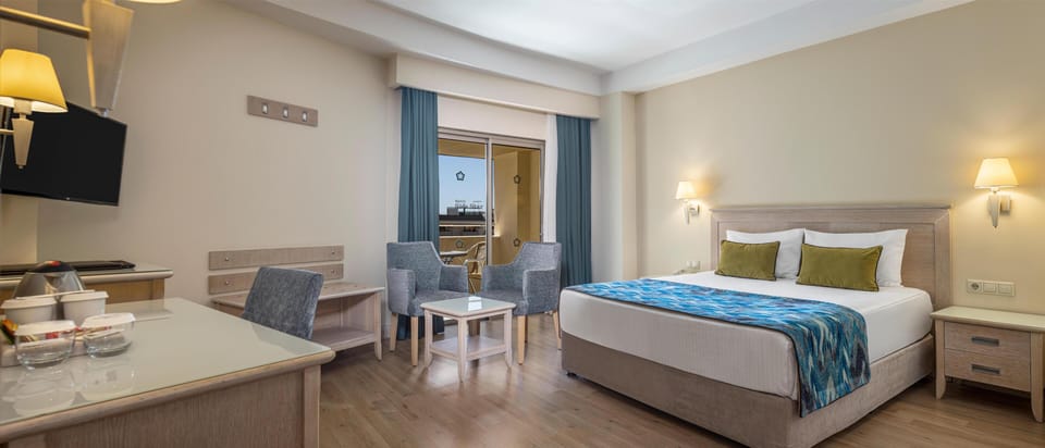 Family Room, 2 Bedrooms (Triple) | Premium bedding, free minibar, desk, blackout drapes