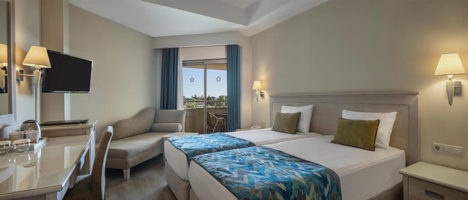 Standard Room, 1 Double or 2 Twin Beds | Premium bedding, free minibar, desk, blackout drapes