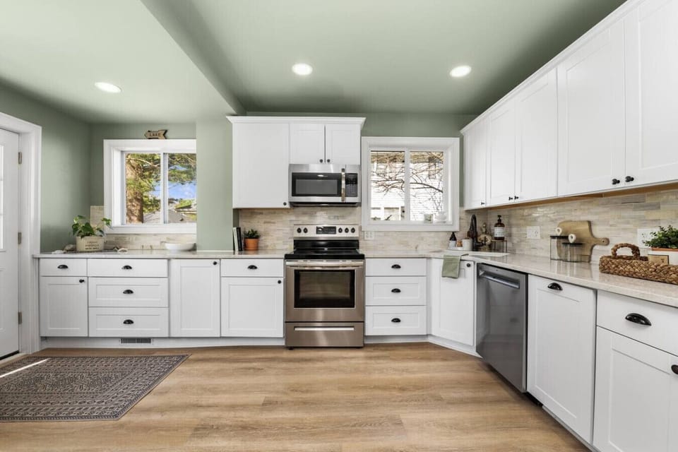 A fully equipped kitchen boasting high-end appliances and ample counter space.