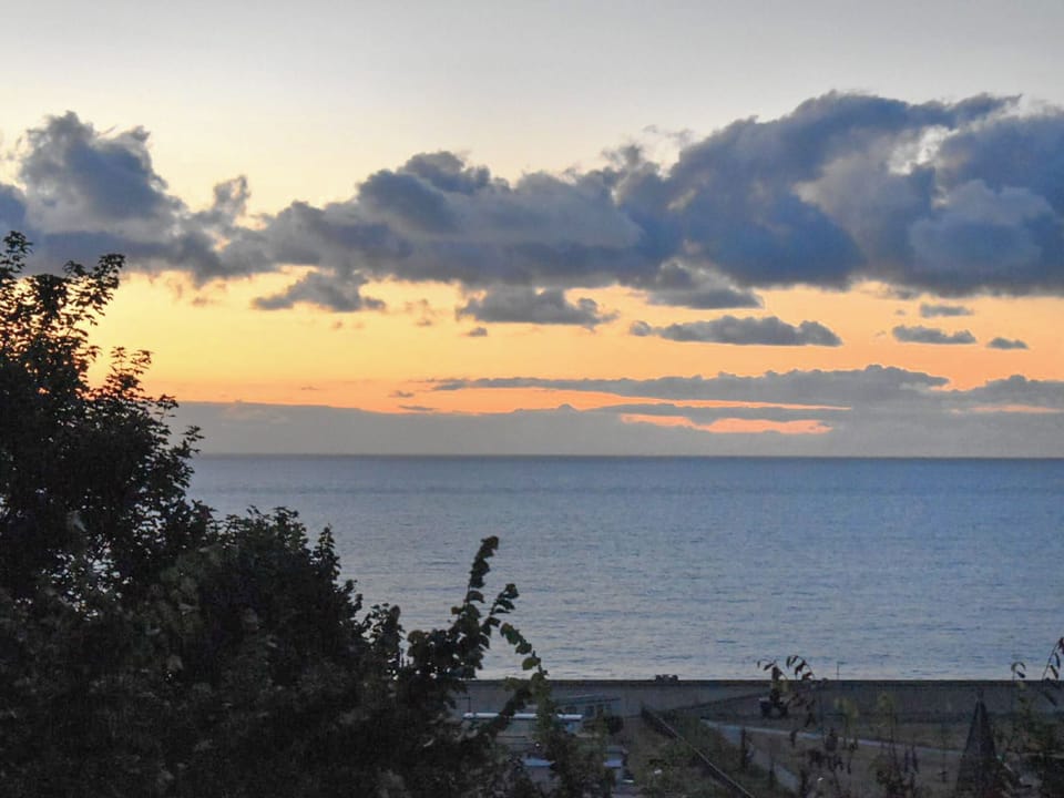 Sunrise seen from the lighthouse | North Cottage, Lowestoft