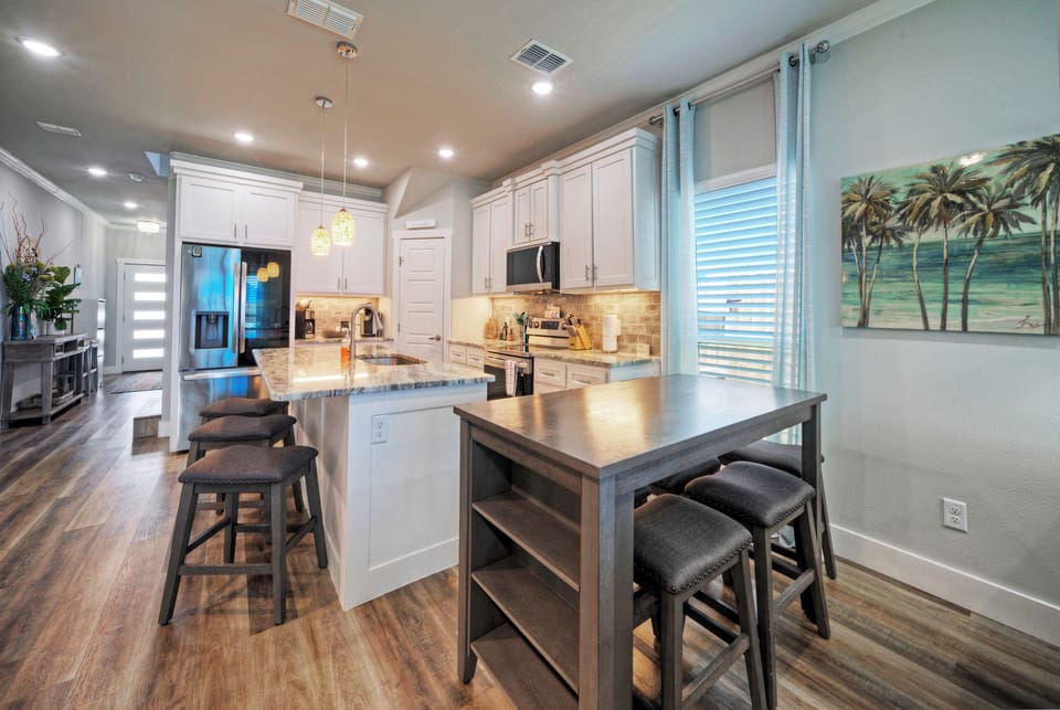 Elegant countertops and rich cabinetry.