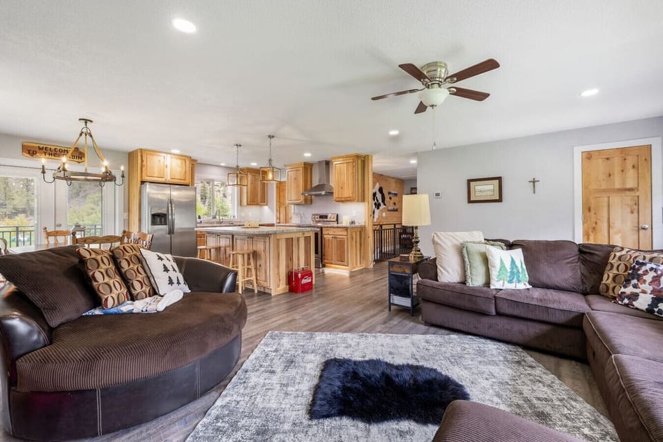 Spacious living room with cozy sofas and an open layout—perfect for relaxing and gathering with loved ones.