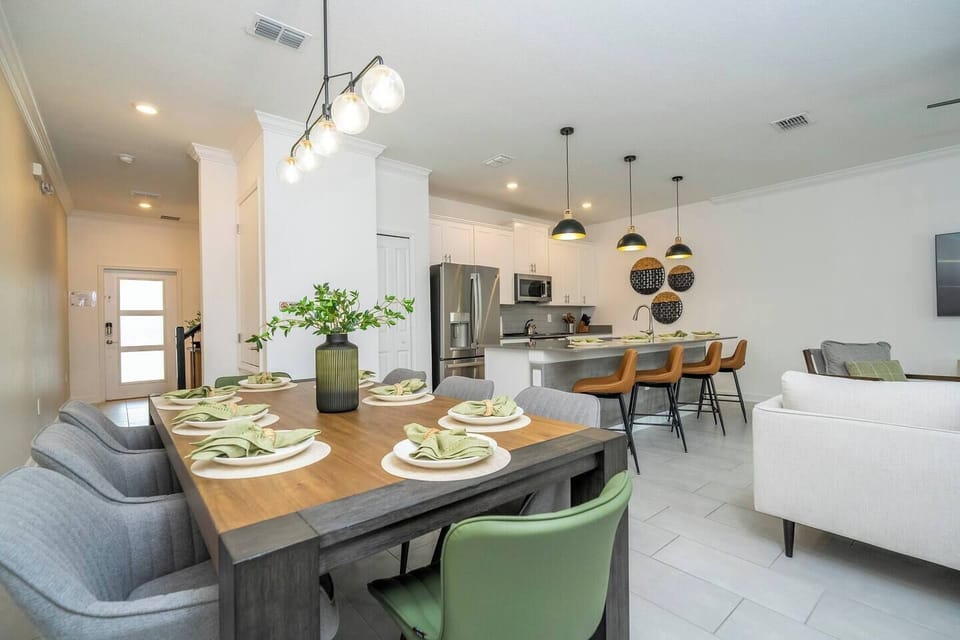 A spacious and comfortable dining area that is perfect for family meals or lively dinner parties, ensuring guests feel right at home from the moment they step inside.