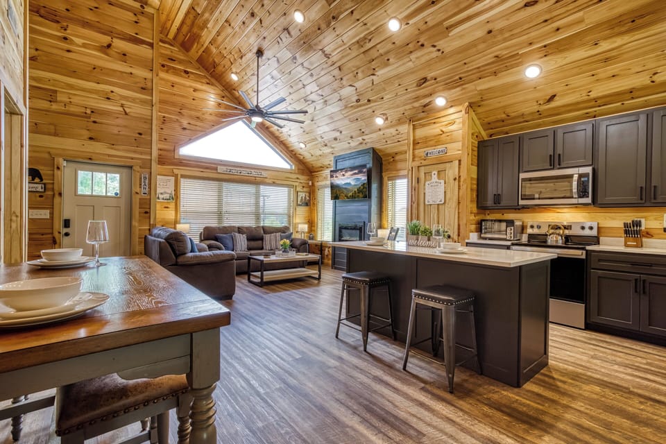 Cabin in the Smokies "Mountain Memories" - Dining area, fully furnished kitchen, and living room