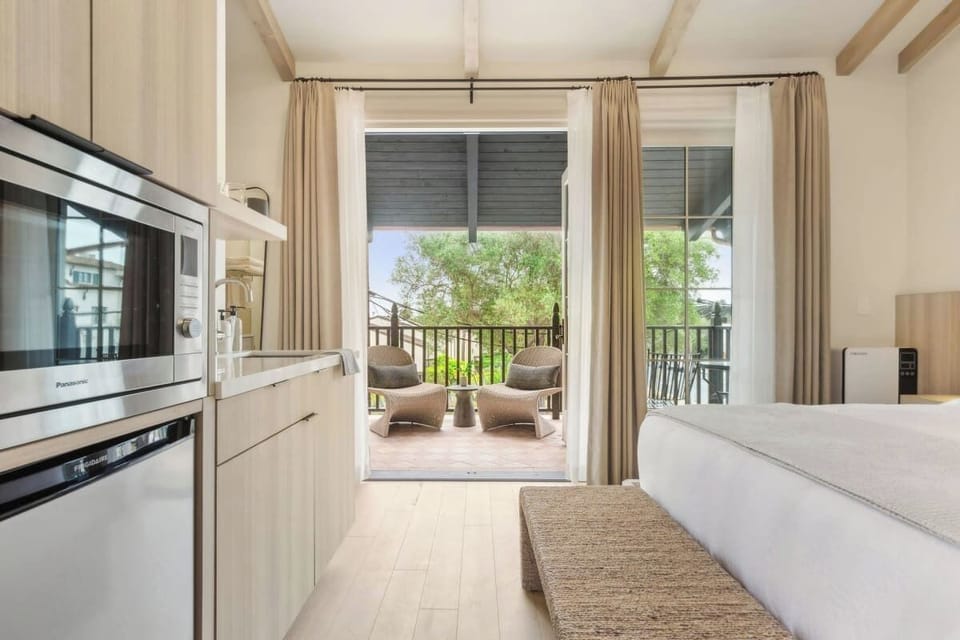 Queen-size bed, sleeps 2 and Kitchenette with Nespresso and Mini Fridge