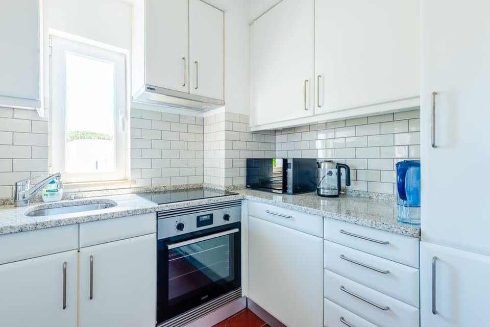 Apartment, 2 Bedrooms, 2 Bathrooms, Garden View | Private kitchen | Coffee/tea maker, microwave
