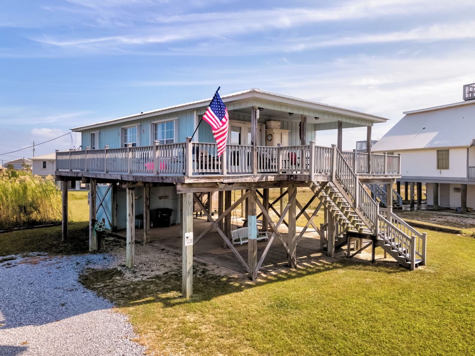 Charming elevated beach house with wraparound deck