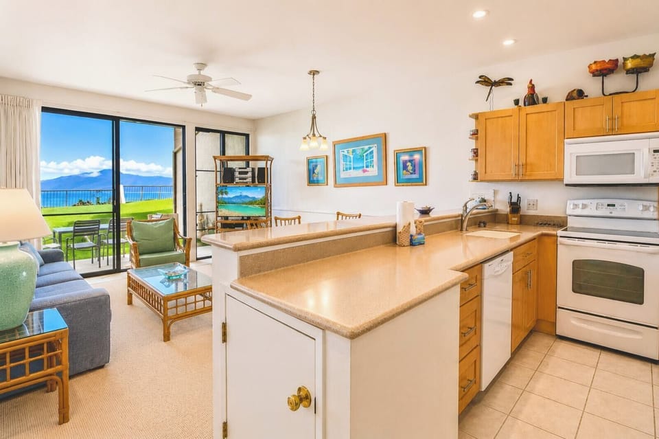Bright, airy, and inviting. Relax in our Hawaiian-style living area after a fun day of snorkeling with the sea turtles at Honokeana Bay. NAP-B43