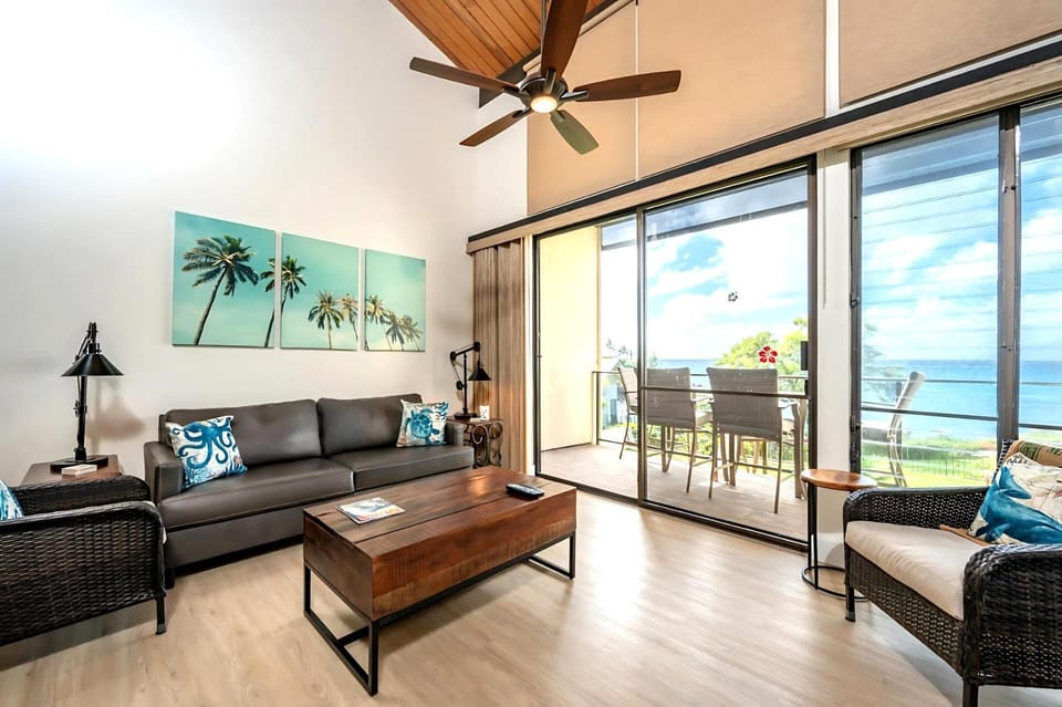 Lounge in style with tropical touches, open skies, and a lanai just steps away from waves and salty breezes NAP-C43