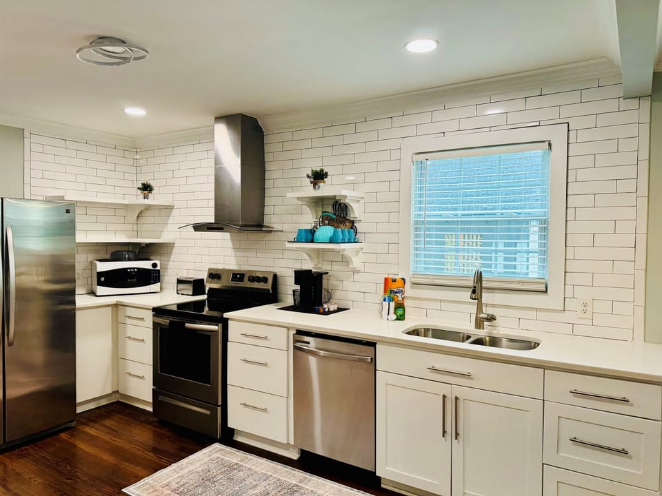 Ample and fully stocked kitchen.