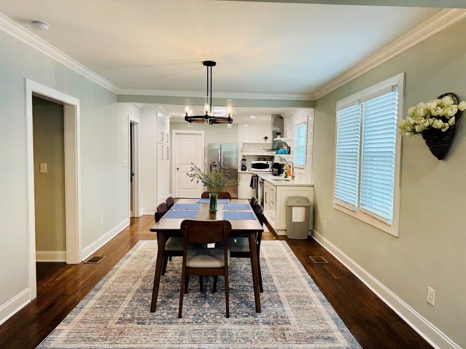 Dining room with table and 6 chairs.