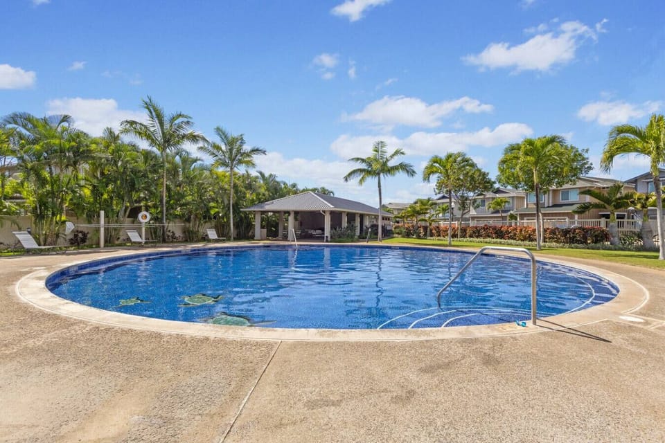 Dive into vacation mode! Relax and cool down at the sparkling pool.
