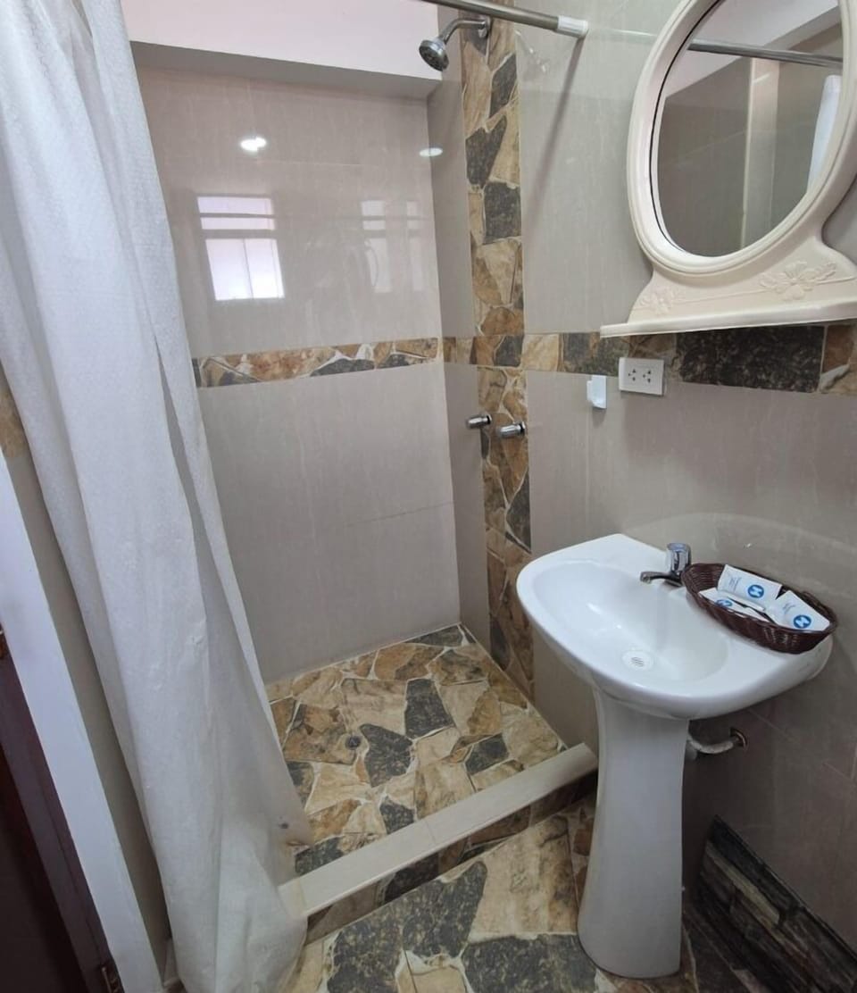 Shower, towels, soap, shampoo