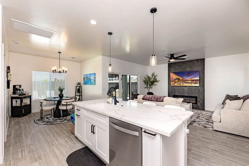 Enjoy an open-concept layout combining the kitchen, dining, and living areas—perfect for gathering and making memories.