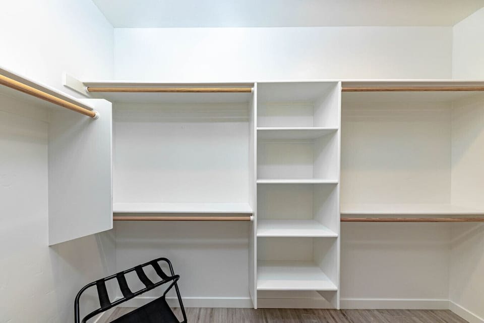 Ample closet space with built-in shelving and hanging racks to keep your belongings organized during your stay.