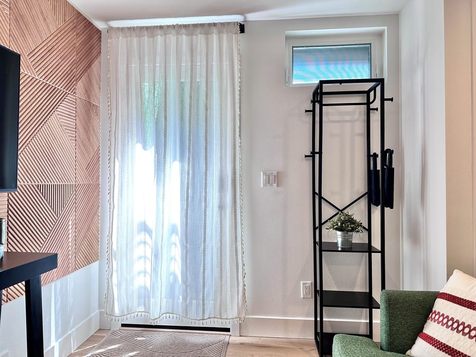 Light-filtering curtain for natural illumination during the day.