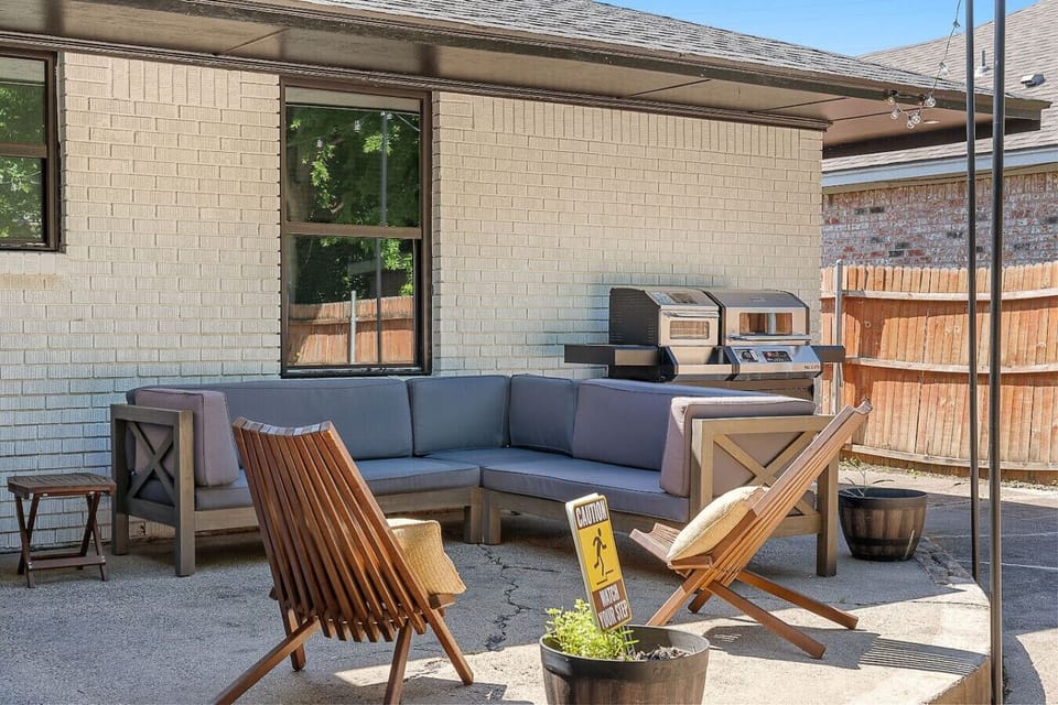Relax and unwind on our spacious patio with comfy lounge seating and a gas grill—perfect for sunny afternoons and evening cookouts!