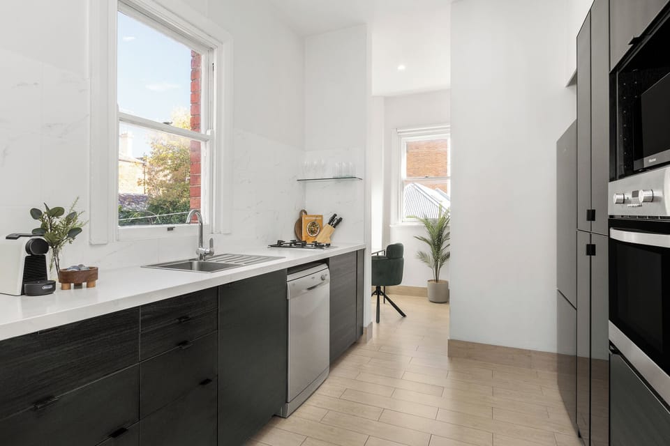 Two Bedroom Apartment with Balcony | Private kitchen | Full-size fridge, microwave, oven, stovetop